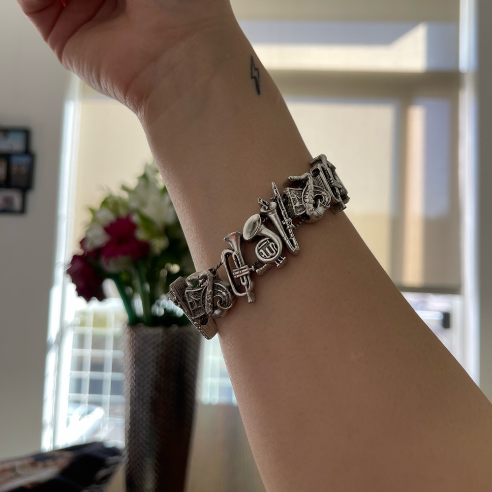 Silver brass instrument bracelet